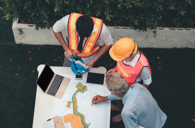 PT USA experts analyzing structural designs to maximize the impact of post-tensioning.